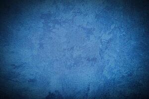 Texture of blue decorative plaster or concrete with vignette. photo