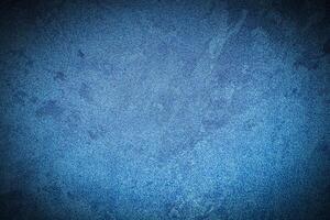 Texture of blue decorative plaster or concrete with vignette. photo