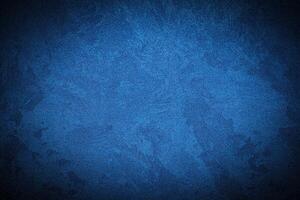 Texture of blue decorative plaster or concrete with vignette. photo