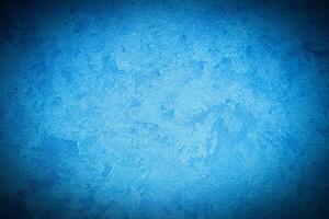 Texture of blue decorative plaster or concrete with vignette. photo