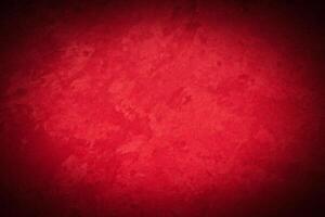Texture of red decorative plaster or concrete with vignette. photo