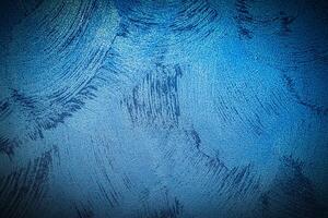 Texture of blue decorative plaster or concrete with vignette. photo