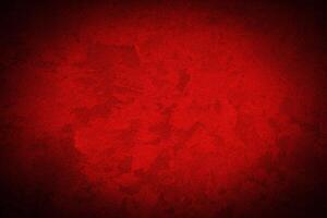 Texture of red decorative plaster or concrete with vignette. photo