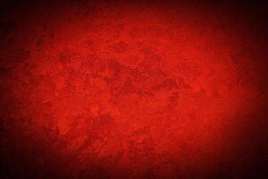 Texture of red decorative plaster or concrete with vignette. photo