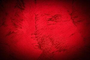 Texture of red decorative plaster or concrete with vignette. photo