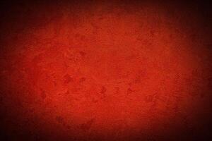 Texture of red decorative plaster or concrete with vignette. photo