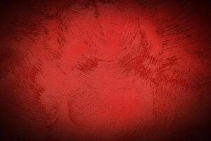 Texture of red decorative plaster or concrete with vignette. photo