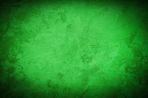 Texture of green decorative plaster or concrete with vignette. photo