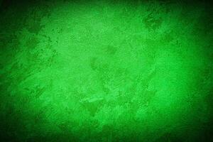 Texture of green decorative plaster or concrete with vignette. photo