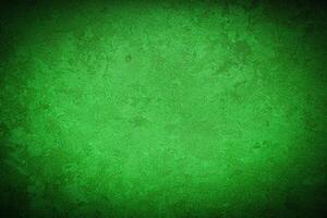 Texture of green decorative plaster or concrete with vignette. photo
