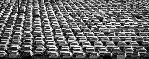 Volkswagen Group Rus, Russia, Kaluga - NOVEMBER 17, 2020 Rows of a new cars parked in a distribution center. Parking in the open air. photo