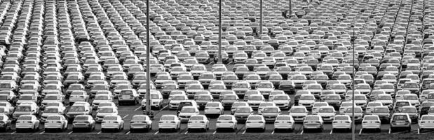 Volkswagen Group Rus, Russia, Kaluga - NOVEMBER 17, 2020 Rows of a new cars parked in a distribution center. Parking in the open air. photo