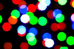 Lights bokeh. Abstract Christmas background for design. photo