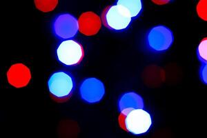 Lights bokeh. Abstract Christmas background for design. photo