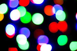 Lights bokeh. Abstract Christmas background for design. photo