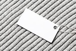 White label on a woolen fabric. Abstract background for design. Art stylized baner or mock up with copy space. photo