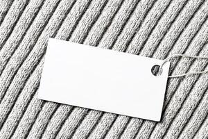 White label on a woolen fabric. Abstract background for design. Art stylized baner or mock up with copy space. photo