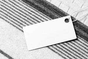 White label on a woolen fabric. Abstract background for design. Art stylized baner or mock up with copy space. photo