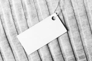 White label on a woolen fabric. Abstract background for design. Art stylized baner or mock up with copy space. photo