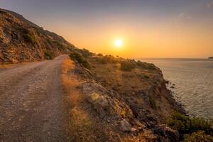 Sunrise on the island of Crete near Spinalonga on a summer. photo