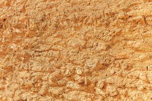 Background of ancient stone wall. Texture of old brick. photo