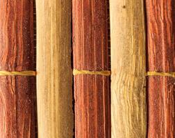 Texture of old bamboo branches with threads. photo