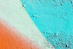 Fragment of colored graffiti painted on a wall. Abstract background for design. photo