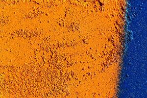 Fragment of colored graffiti painted on a wall. Abstract background for design. photo