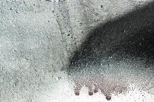 Fragment of colored graffiti painted on a wall. Abstract background for design. photo