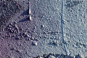 Fragment of colored graffiti painted on a wall. Abstract background for design. photo