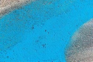 Fragment of colored graffiti painted on a wall. Abstract backdrop for design. photo