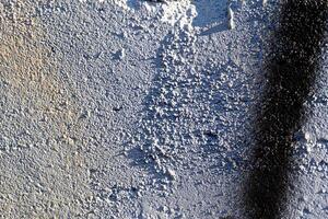 Fragment of colored graffiti painted on a wall. Abstract background for design. photo