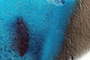 Fragment of colored graffiti painted on a wall. Abstract backdrop for design. photo
