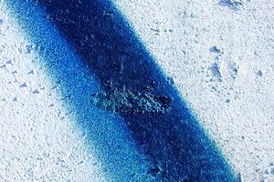 Fragment of colored graffiti painted on a wall. Abstract background for design. photo