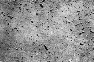 Texture of a gray concrete wall. Abstract backdrop for design with copy spase for a text. photo