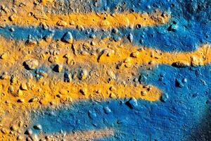 Fragment of colored graffiti painted on a concrete wall. Abstract background for design. photo