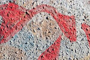 Fragment of colored graffiti painted on a concrete wall. Abstract background for design. photo