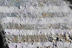 Fragment of colored graffiti painted on a concrete wall. Abstract background for design. photo