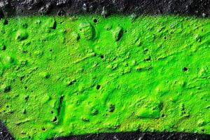 Fragment of colored graffiti painted on a concrete wall. Abstract background for design. photo