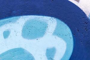 Graffiti painted on a concrete wall texture. photo