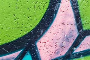 Graffiti painted on a concrete wall texture. photo