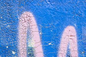Graffiti painted on a concrete wall texture. photo