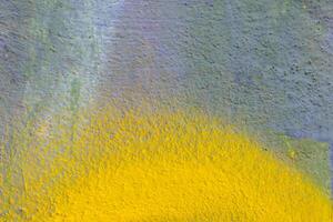 Graffiti painted on a concrete wall texture. photo