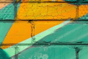 Graffiti painted on a brick wall texture. photo