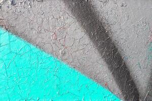 Fragment of colored graffiti painted on a wall. Bright abstract background. photo