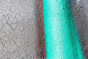 Fragment of colored graffiti painted on a wall. Bright abstract background. photo