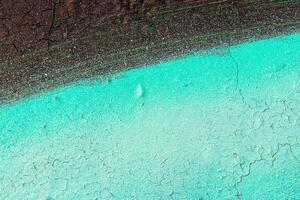 Fragment of colored graffiti painted on a wall. Bright abstract background. photo
