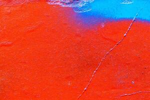 Fragment of colored graffiti painted on a wall. Bright abstract background. photo