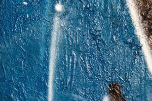 Fragment of colored graffiti painted on a wall. Bright abstract background. photo