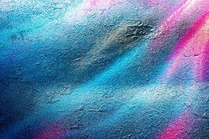 Fragment of colored graffiti painted on a wall. Bright abstract background. photo